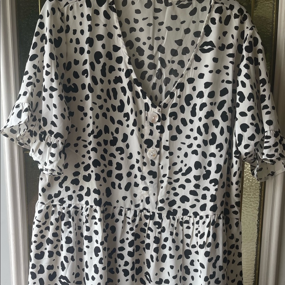 This dress is adorable for summer comes a little below the knee.